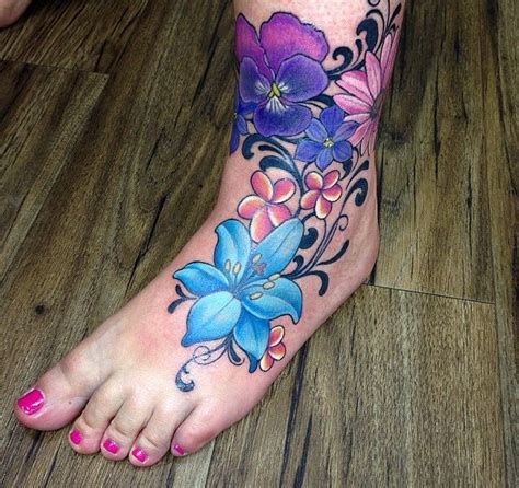 flower tattoo on foot|More.